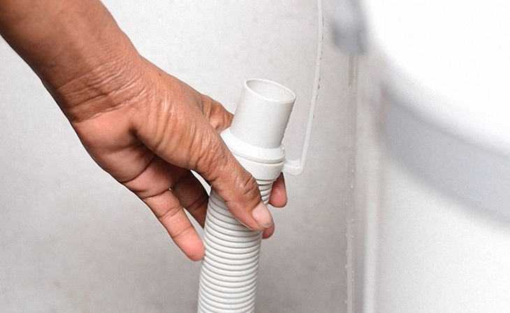 vệ sinh ống xả máy giặt